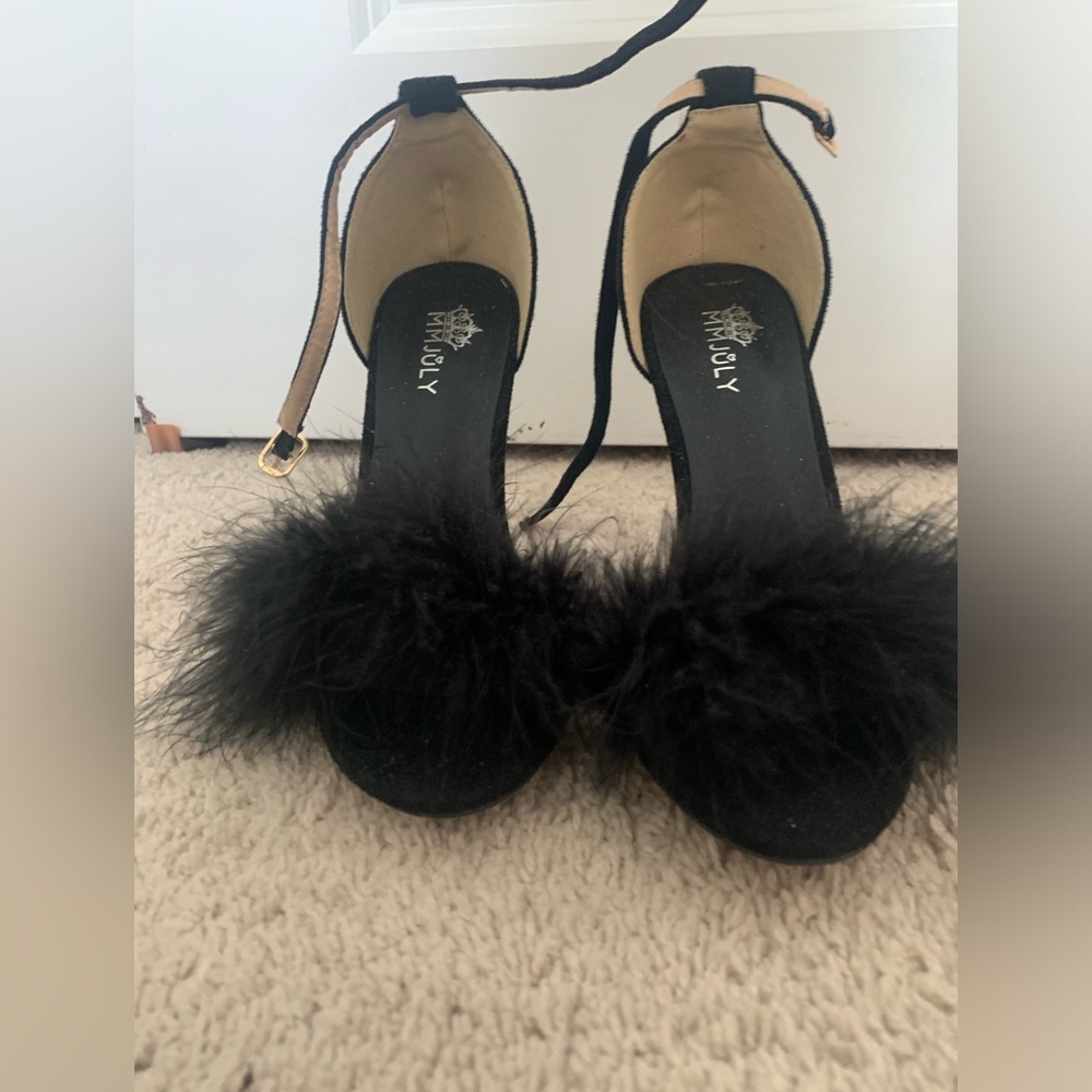 Fluffy six inch black stilettos in size 7 womens